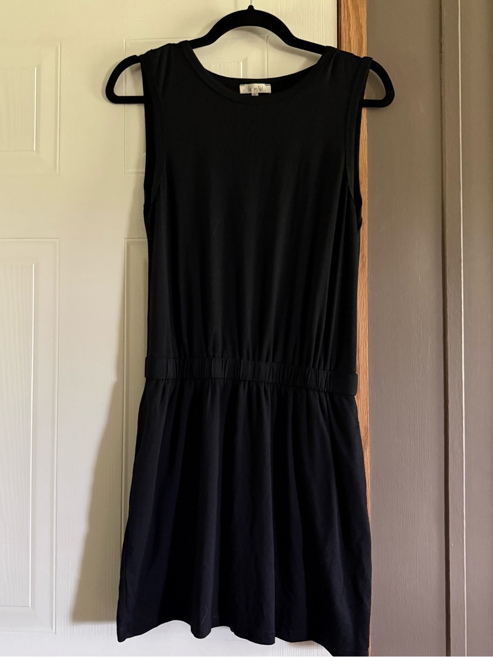 LA MIEL Boutique Black Sleeveless Mini Dress
